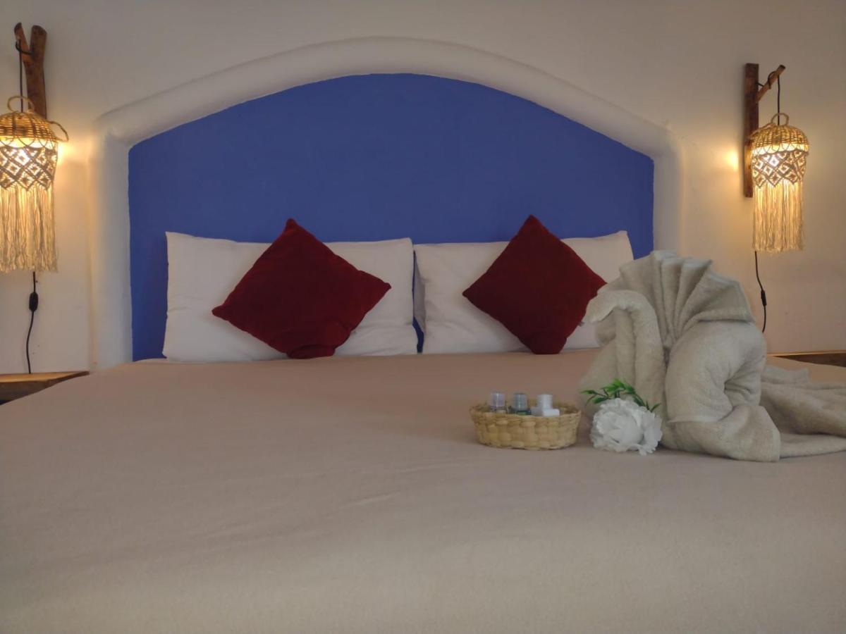 Mio Tulum Hotel Boutique Exterior foto A bedroom at the hotel