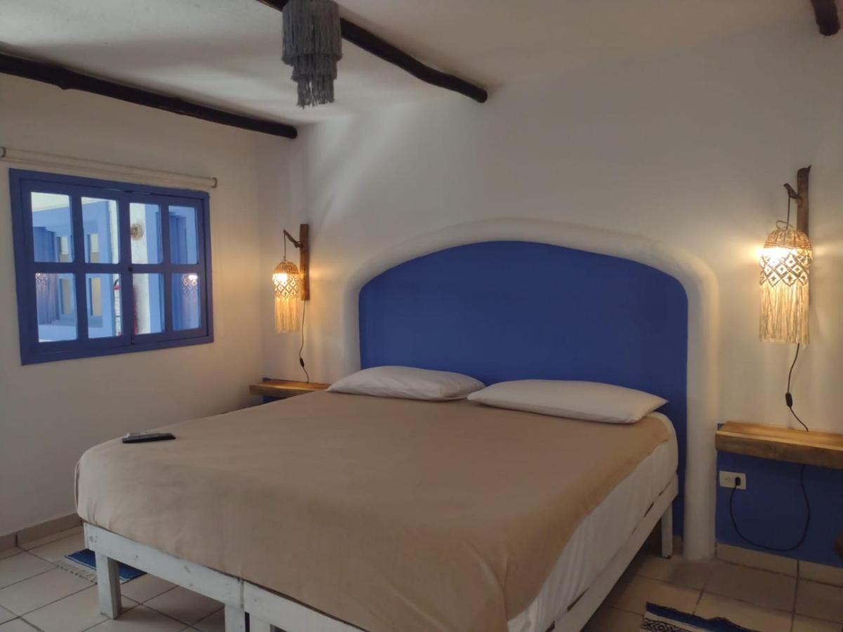Mio Tulum Hotel Boutique Exterior foto A bedroom in a hotel in Tunisia