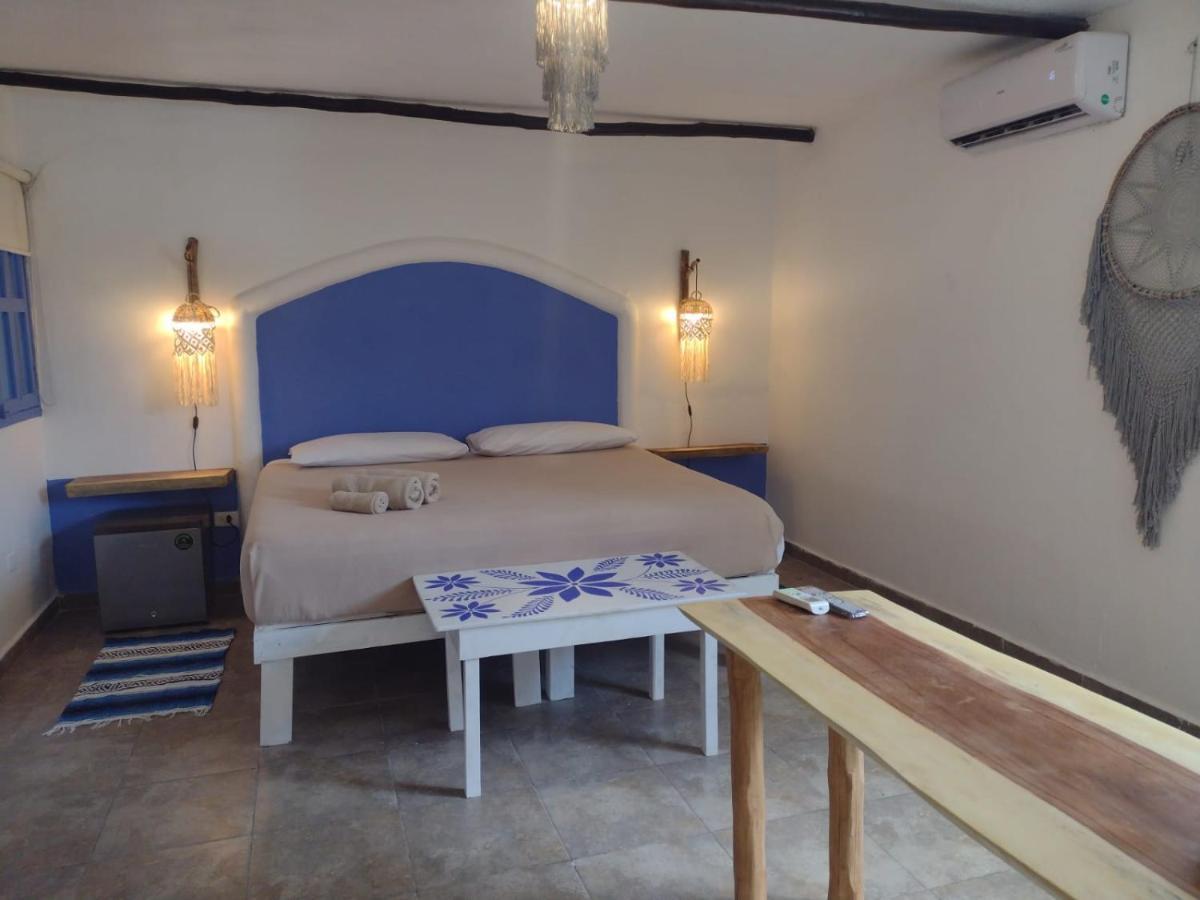 Mio Tulum Hotel Boutique Exterior foto A bedroom in the hotel